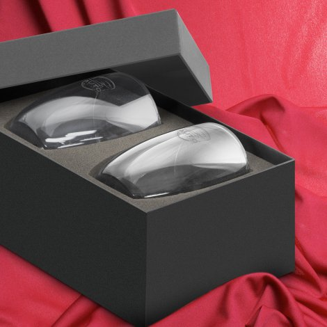 Two clear Tivoli double-wall glasses with subtle sample etching, presented in a black gift box on red fabric.